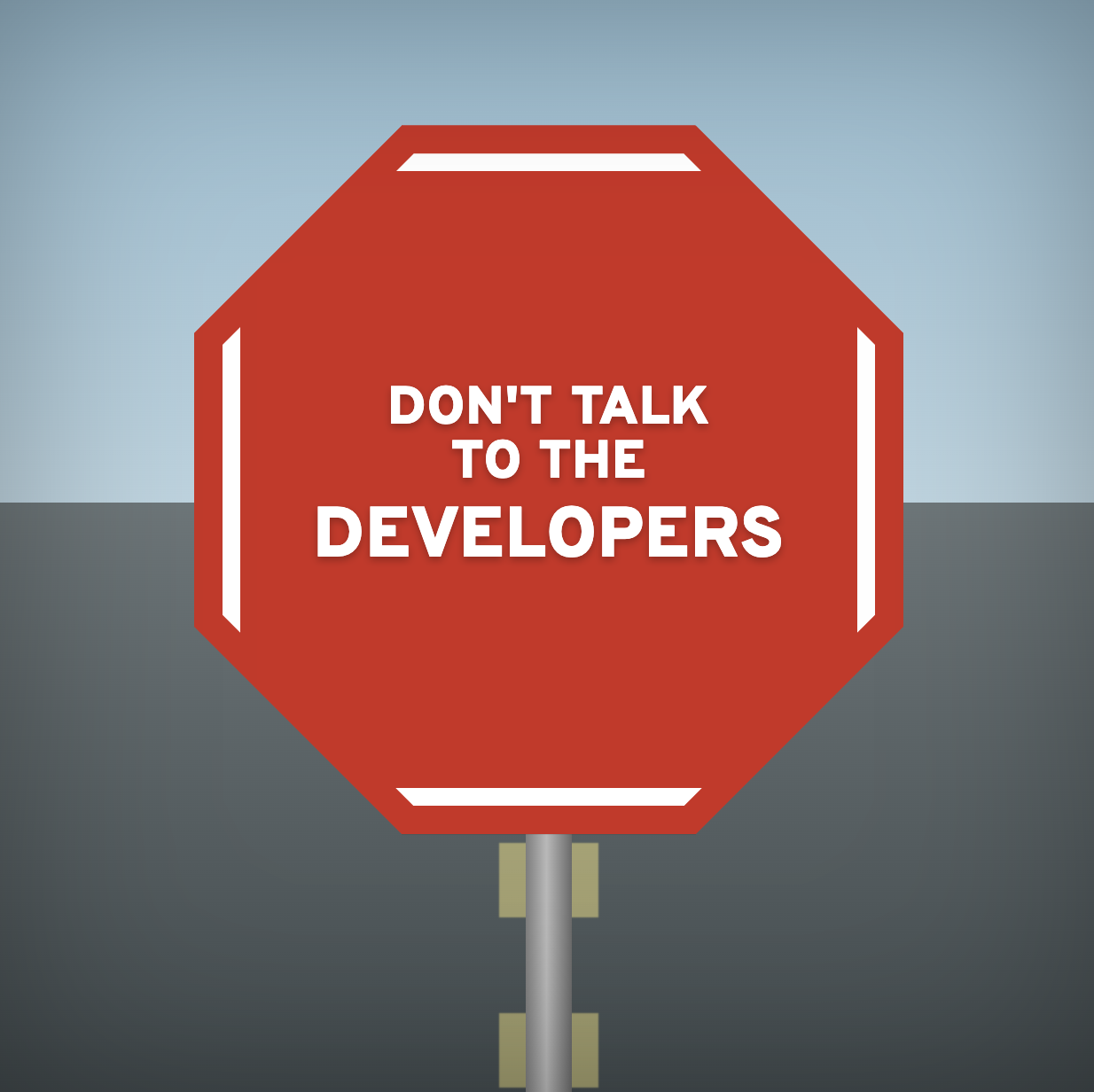A developer with headphones on, in the classic 'don't talk to me, I'm in the zone' pose